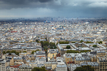Obraz premium Above Paris from Sacre Couer tower in Montmartre with dramatic sky, France