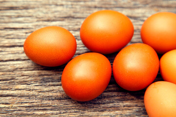 Natural chicken eggs on different backgrounds. Chicken eggs on a hemp, table, straw. The concept of food, diet, cooking.