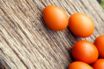 Natural chicken eggs on different backgrounds. Chicken eggs on a hemp, table, straw. The concept of food, diet, cooking.