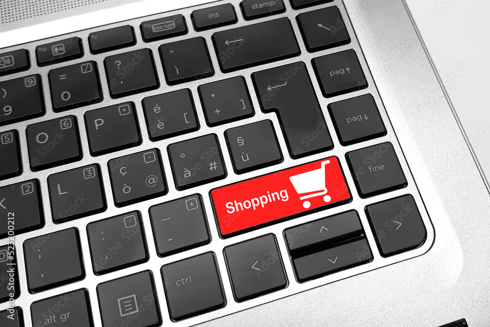 Fototapete concepts of online shopping or online store, with shopping cart symbol and shopping text on red keyb