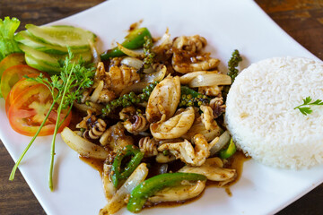 Kampot. Cambodia. Kampot Province. Colonial district. Dish of Squid with green pepper