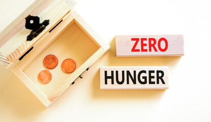 Zero hunger symbol. Concept words Zero hunger on wooden blocks on a beautiful white table white...