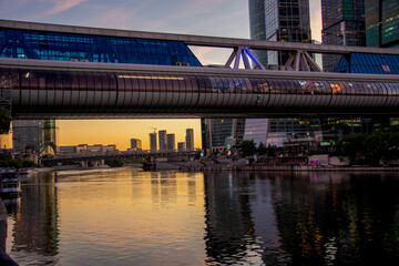 Moscow City skyscrapers on the river, business center summer evening Russia