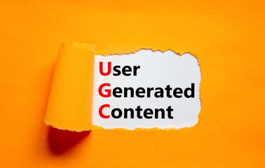 UGC user generated content symbol. Concept words UGC user generated content on white paper on a...