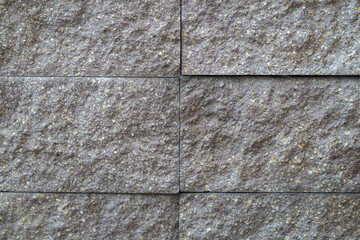 Stone wall as a pattern, rough house wall as a background