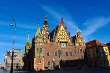 Fototapeta na wymiar old town hall building with a clock in the center on Wroclaw Square Poland