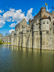 Fototapeta na wymiar Ghent palace wall on Leie river in Ghent, Belgium