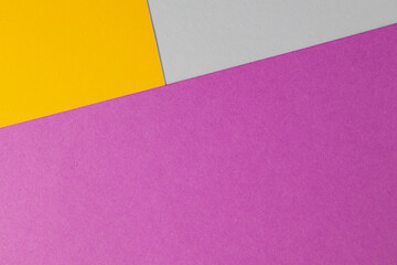 Purple, yellow and white colored paper texture background. Abstract background from craft paper