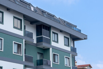 Modern multi-apartment residential building. New multi-storey building.