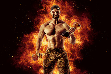 Fototapeta na wymiar Bodybuilding concept. Brutal strong muscular bodybuilder athletic man pumping up muscles with barbell on black background with fire