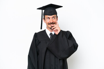 Young university graduate man isolated on white background thinking an idea while looking up