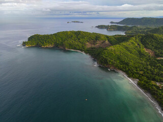 Drone view of Playa Danta, Brumel Island, and Zapotal point of Finca Guacamaya in Guanacaste, Costa Rica
