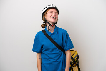 Young English woman with thermal backpack isolated on white background laughing