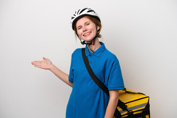 Young English woman with thermal backpack isolated on white background extending hands to the side for inviting to come