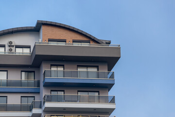 Modern multi-apartment residential building. New multi-storey building.