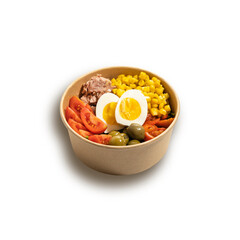 bowl with fish, corn, egg, tomato. in a box with you on a white background