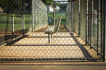 Empty baseball dugout on baseball field