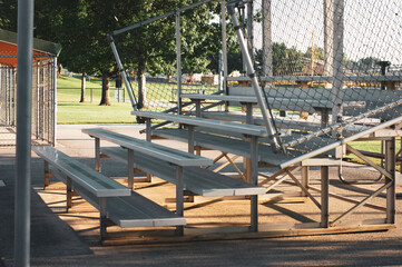 Empty bleachers at baseball and softball field