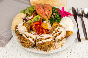 Lebanese felafel salad with tabbouleh & tahini dressing