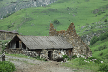 An old stone hut or barn in the mountains
