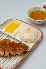 Pork cutlet and miso soup in a bowl