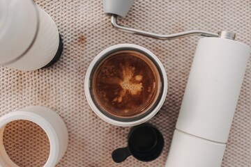 Espresso coffee crema with grind and french press manual equipments.