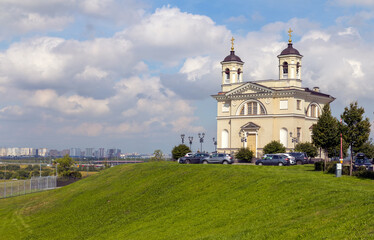 Fototapeta na wymiar Bolshoye Pulkovo historic district. Church of the Smolensk Icon of the Mother of God in Pulkovo. Saint-Petersburg, Russia.