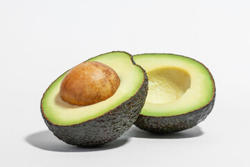 cut avocado on white background