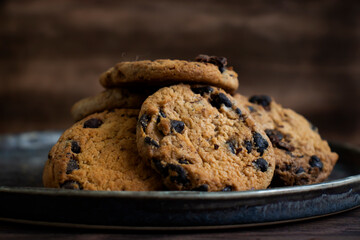 Cookies with chocolate on a dark background