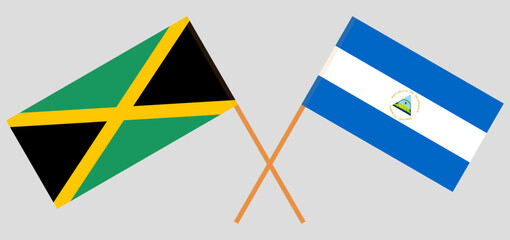 Crossed flags of Jamaica and Nicaragua. Official colors. Correct proportion