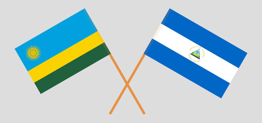 Crossed flags of Rwanda and Nicaragua. Official colors. Correct proportion