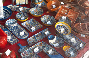Typical Souvenirs at souvenir shopping in Porto city. colorful Portuguese blue ceramics, local...