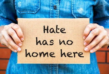 Woman hands holding piece of cardboard