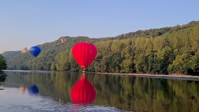 Spectacular hot air balloon in Dordogne in France. Above river Dordogne.