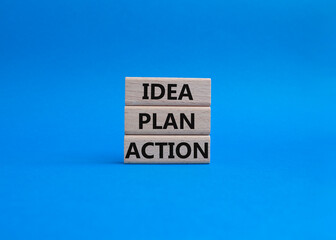 Idea Plan Action symbol. Wooden blocks with words Idea Plan Action. Beautiful blue background. Business and Idea Plan Action concept. Copy space.