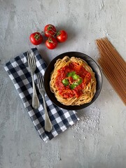 pasta with tomato sauce and basil