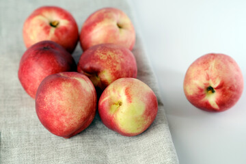 Apple nectarine - Nectarine crossed with apple, on a white table.