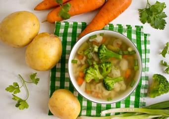 Vegetable soup on wooden background