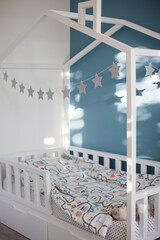 House shaped bed in childs room