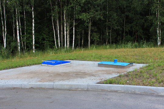 Two underground fuel storage tanks on the territory of a gas station, equipped platform