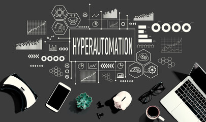 Hyperautomation theme with electronic gadgets and office supplies - flat lay