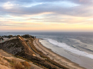 Rincon Point at Sunset.  Pastel sky over the Pacific Ocean. Beach and Waves.