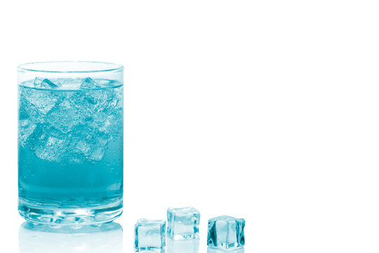 A glass of soft drink on blue colour with ice cubes isolate on white background.
