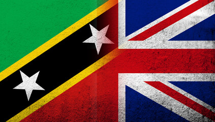 Fototapeta premium National flag of United Kingdom (Great Britain) Union Jack with Saint Kitts and Nevis National flag. Grunge background