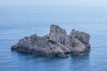 Fototapeta na wymiar Skeludi islet on Ionian Sea shore in Palaiokastritsa village, Corfu Island in Greece