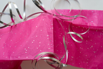 silver ribbon and tissue paper
