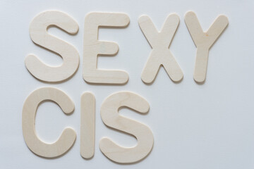 sign with wood letters: sexy cis