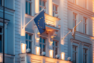 EU flag on government building, illuminated EC flag - obrazy, fototapety, plakaty