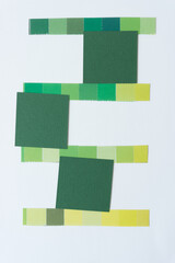 yellow-green paper squares and stripes