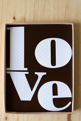 love in a box on wood